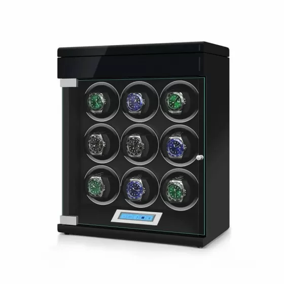 Angled view of black automatic watch winder showing 4 rotating winding slots and extra storage below