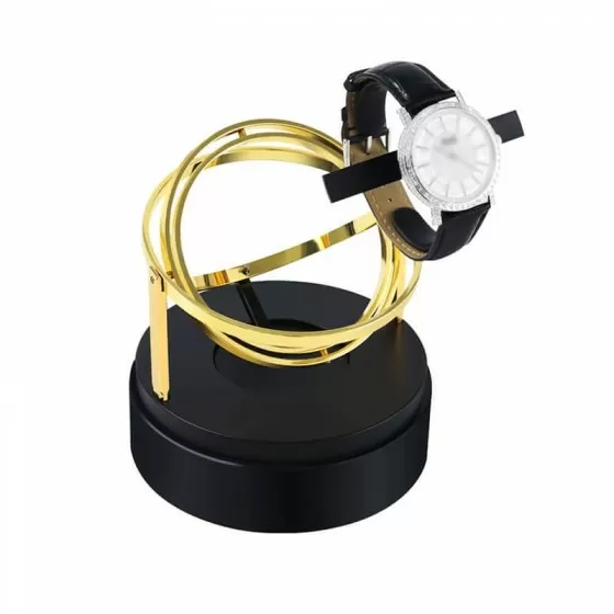 Close-up of gold-plated planetary gear mechanism inside Roroos Astronomy watch winder