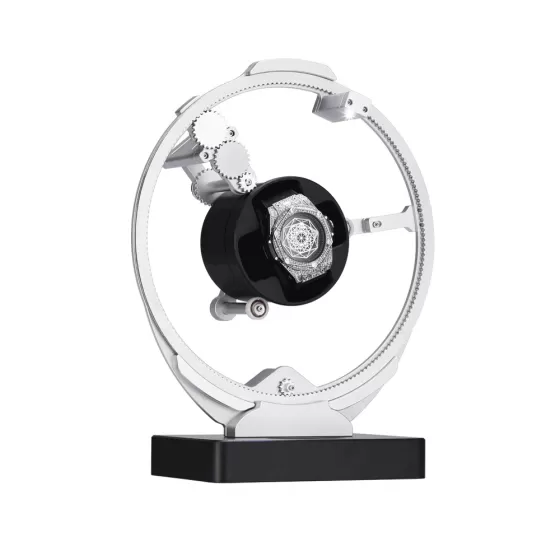 Roroos silver orbital watch winder displayed on desk with luxury automatic watch inside