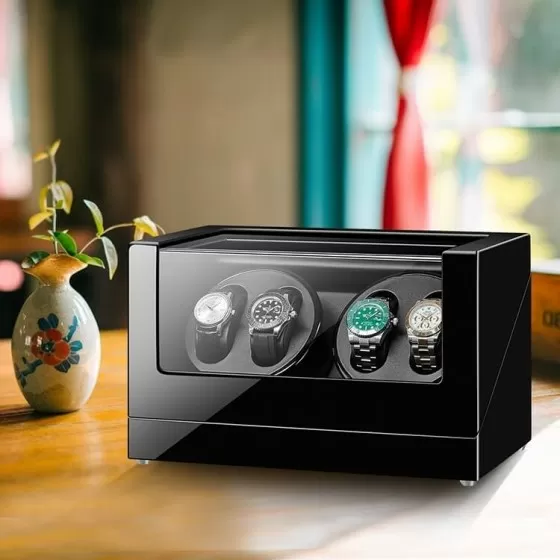 Black wood grain detail on quad watch winder — solid wood construction close-up