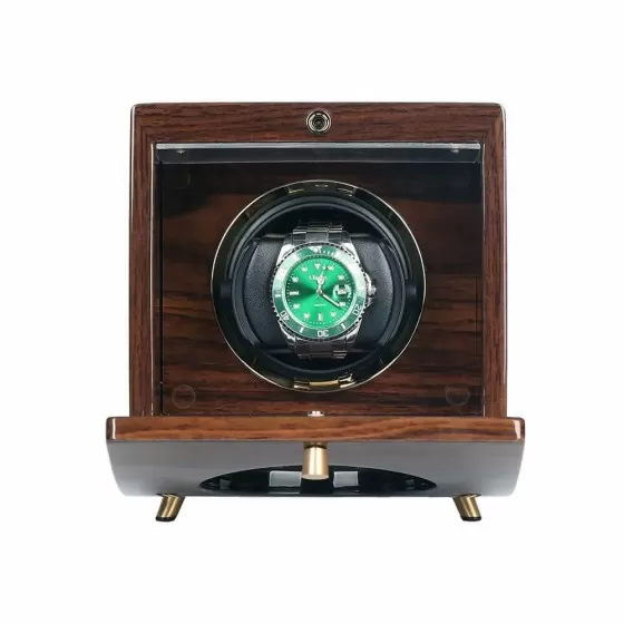Interior of retro solid wood watch winder showing winding rotor and cushion pillow for automatic watch