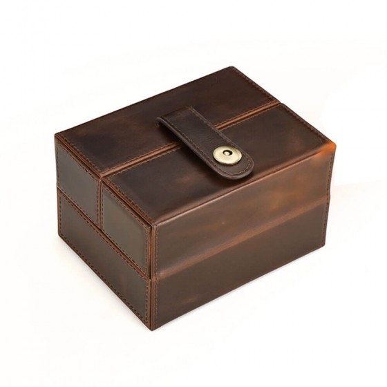 Leather mechanical watch case open showing 2 suede-lined padded cushions