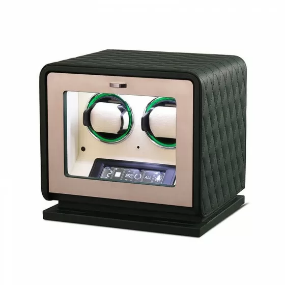 Green leather Rolex watch winder open showing beige velvet interior and dual rotors
