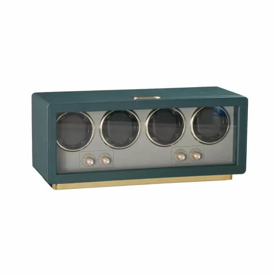 Rolex automatic watch placed in green leather 4-slot watch winder - angled view