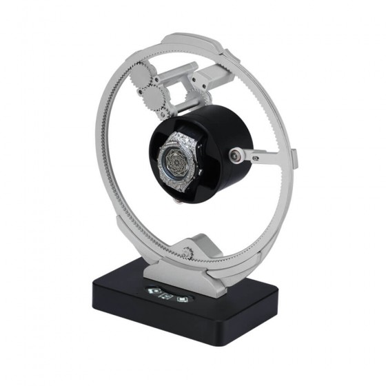 Dark grey orbit watch winder holding automatic watch in full rotation position