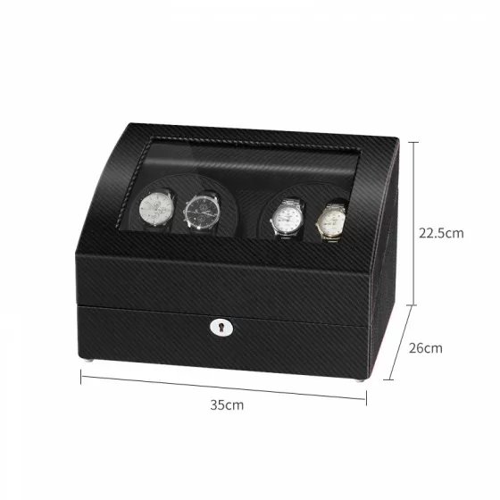 Lower storage drawer of carbon fiber watch winder box holding six watches and accessories