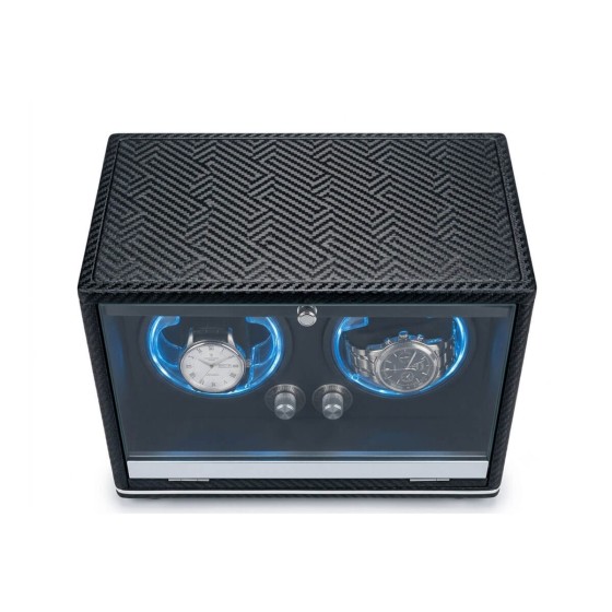 Carbon fiber double watch winder 3/4 angle — herringbone and weave exterior with two independent chrome mode knobs and aluminum base strip