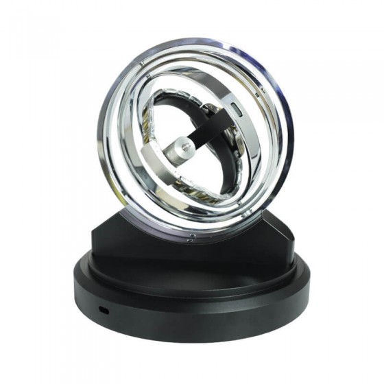 Close-up of polished silver concentric ring mechanism of Roroos Astronomy Saturn automatic watch winder