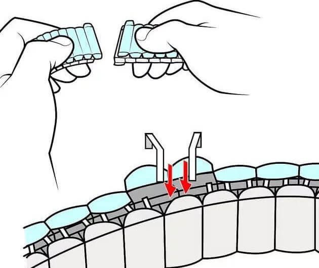 flip open the cover on the bottom edge