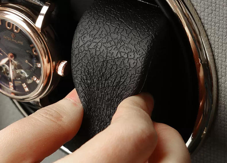 Black suede interior of Roroos leather 4-watch automatic winder case with padded watch cushions