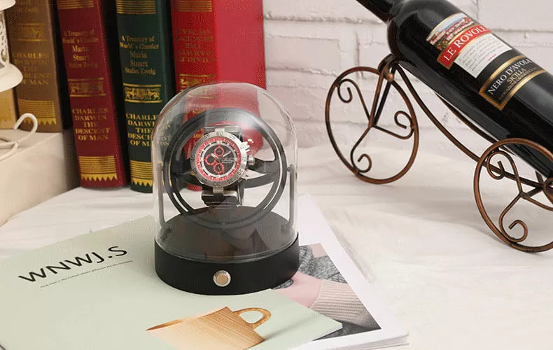Roroos Perseus black gyro watch winder on desk — kinetic sculpture for watch collectors